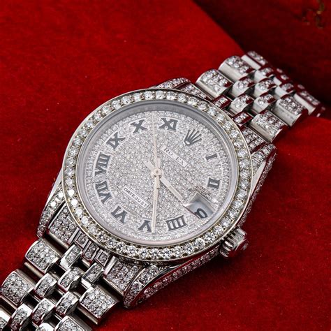 silver Rolex watch with diamonds